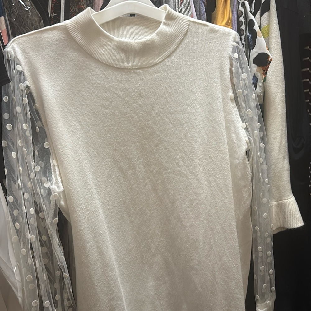 White dress, polka dot sleeves, love sweater dresses? It’s made just for you!